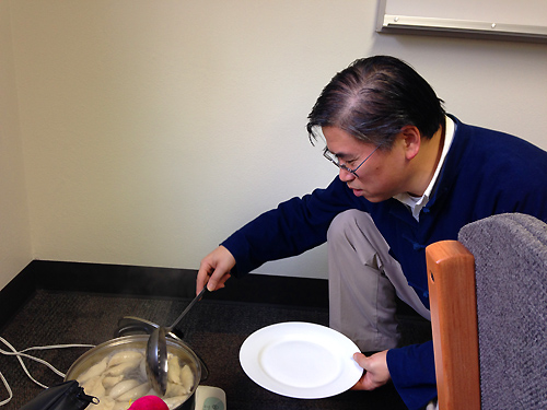 Professor Zhang is boiling dumplings for students-That's how we teach in Chinese program!