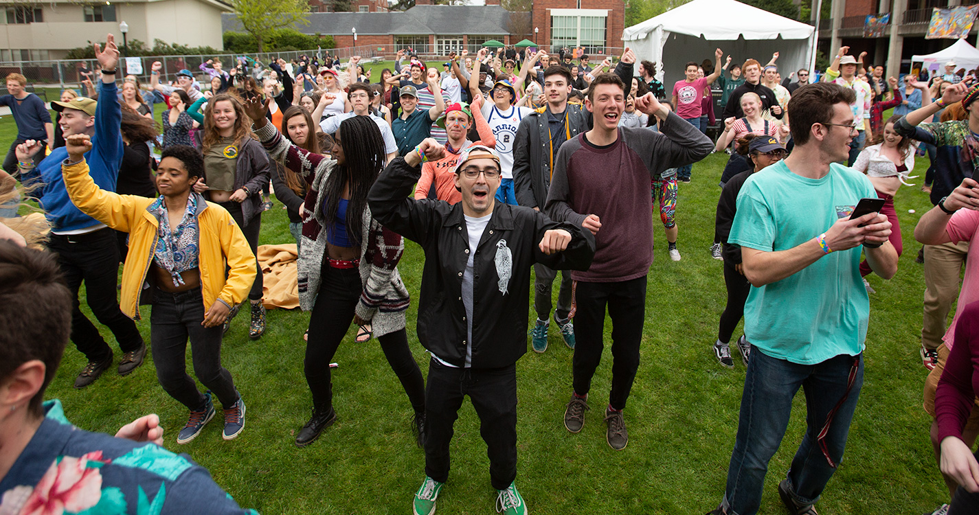 Students do "jazzercise" on Brown Field at Wulapalooza.