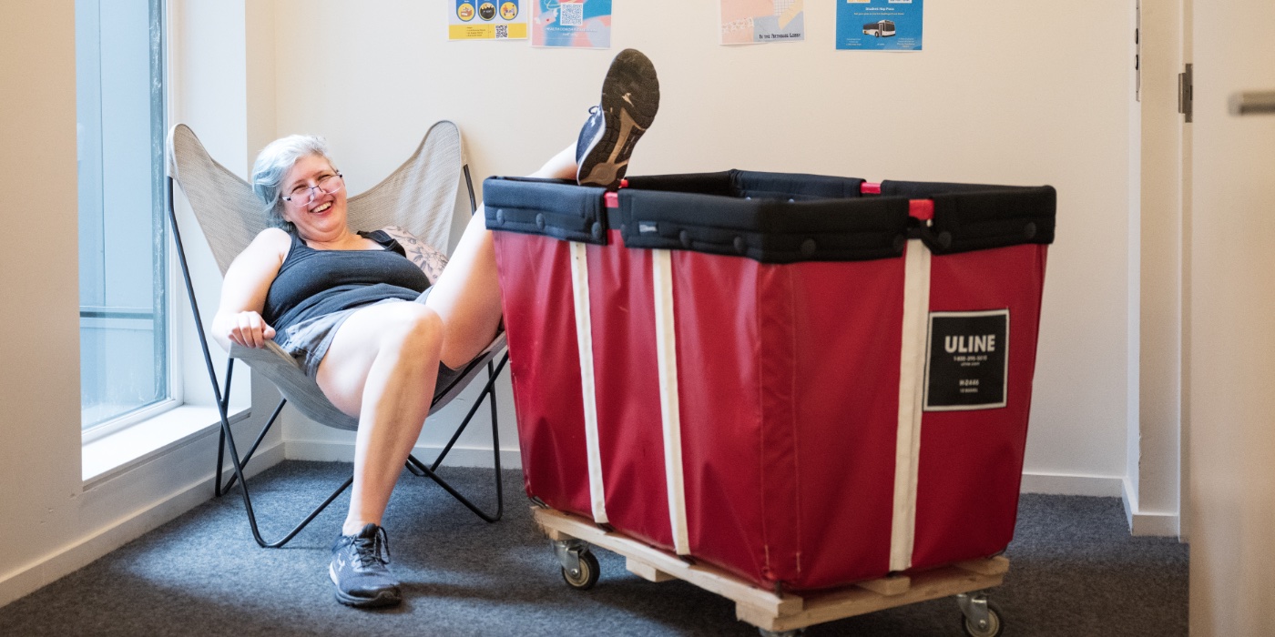 A PNCA student relaxes during move in