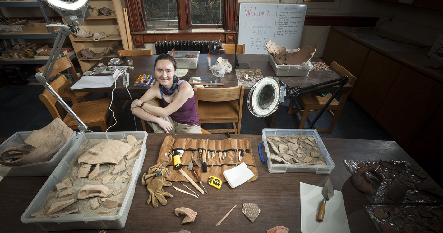 Archaeology Major Sarah Crabb in the Archaeology Lab with her tools and lab equipment