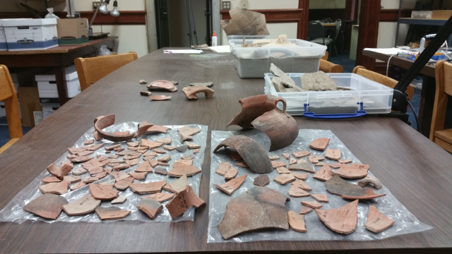Pottery being assembled in the Archaeology Lab