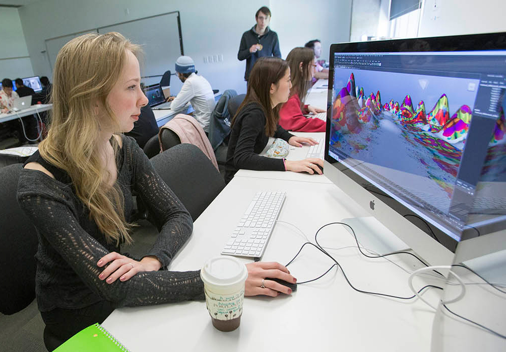 female student working in a design program