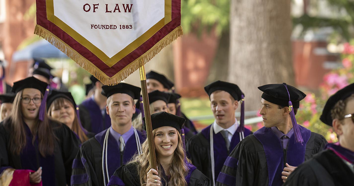 College of Law students march at commencement 