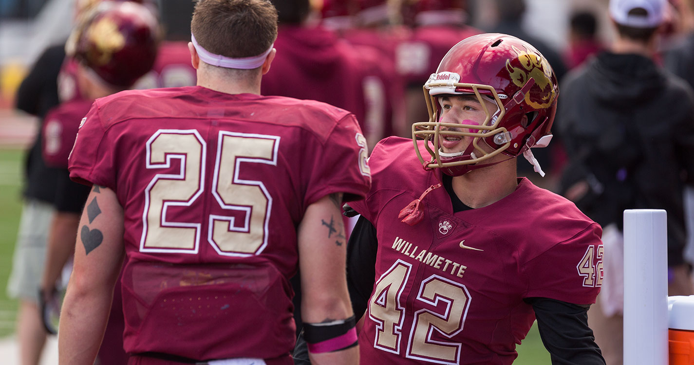Willamette football player on the field