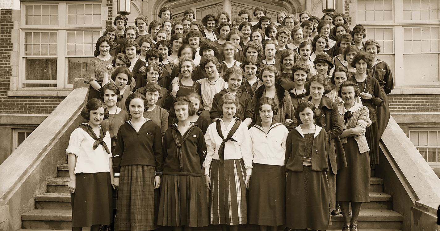 In the early 1920s, students pose on the front steps of Lausanne Hall, which housed Willamette’s Women’s College.