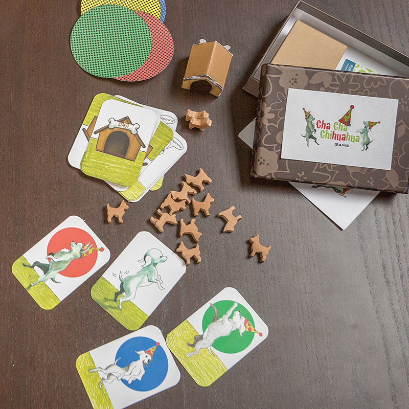 Prototype of Cha-Cha Chihuahau game with wooden dog cutouts