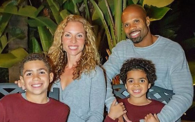 Brandon Nash with wife and children