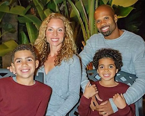 Brandon Nash with wife and children
