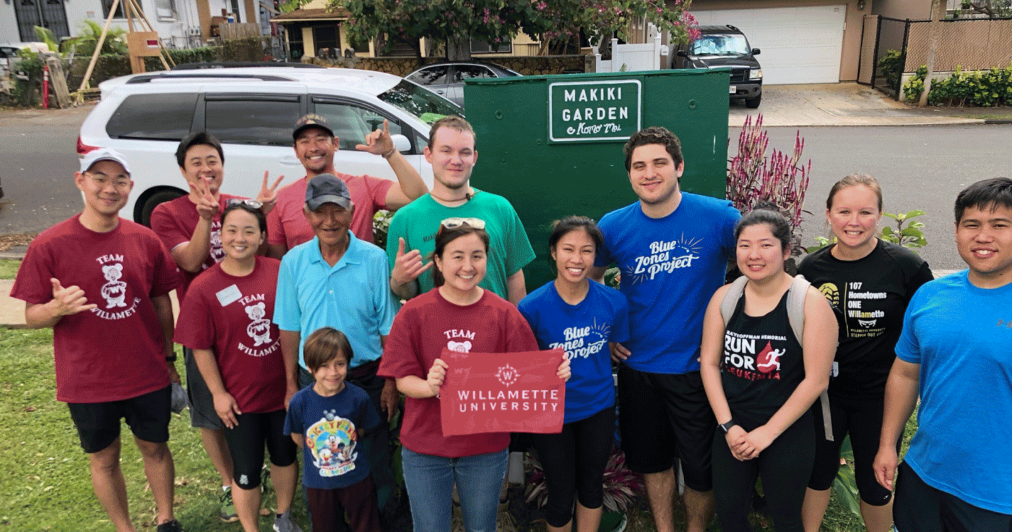 Volunteers clean up a community garden in Hawaii