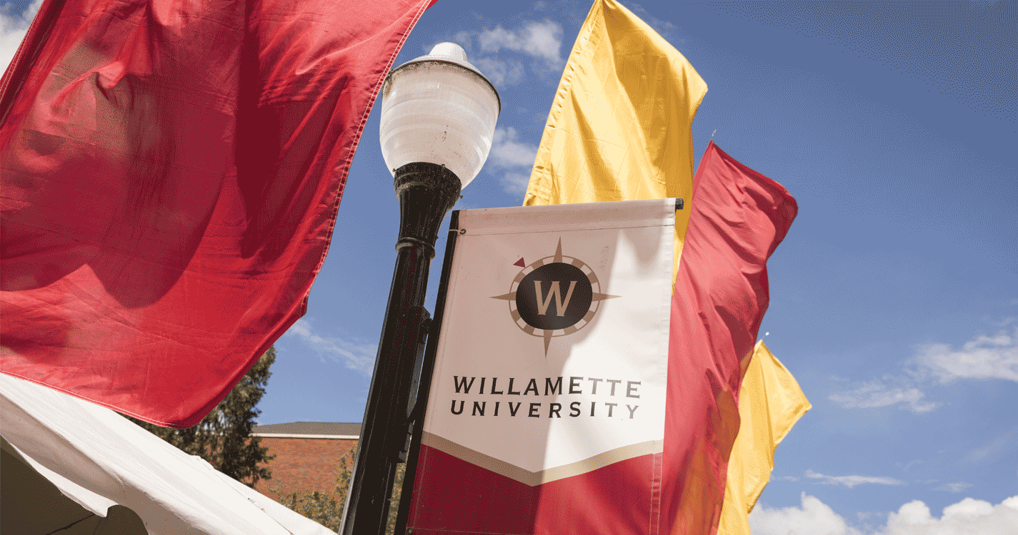 Gold and red banners with a Willamette University banner