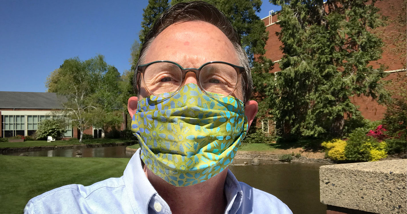 Professor of Theatre Bobby Brewer-Wallin wears a fabric mask he created. Several faculty and staff hand-made face masks for students who remain on campus. 