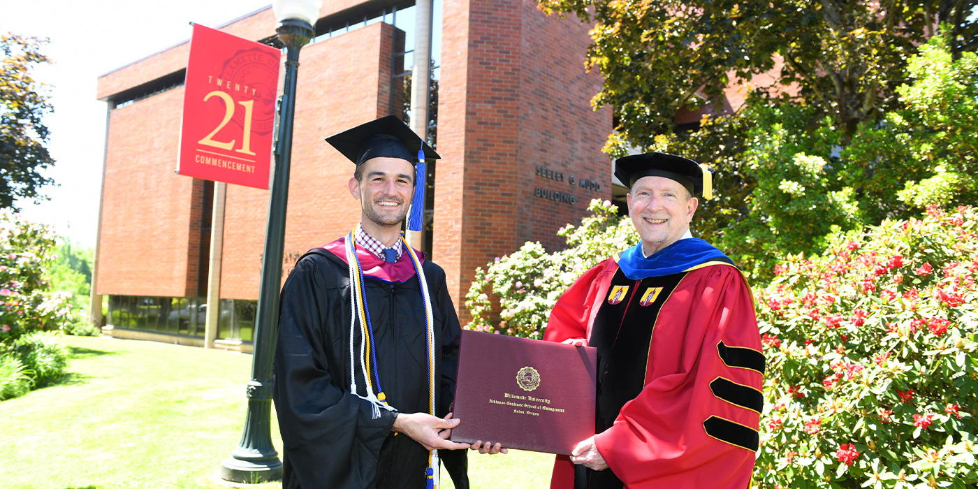 Will Fruhwirth received a diploma from Dean Mike Hand