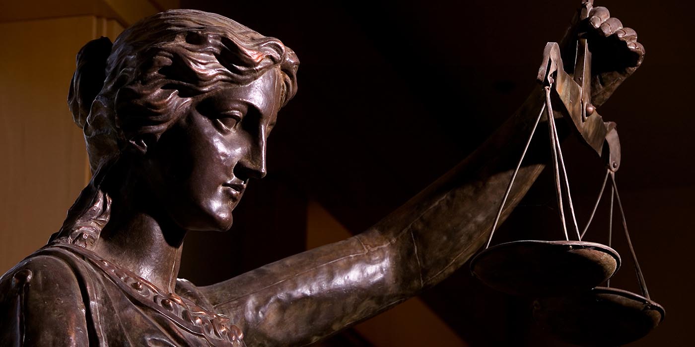 Lady Justice statue in the College of Law building