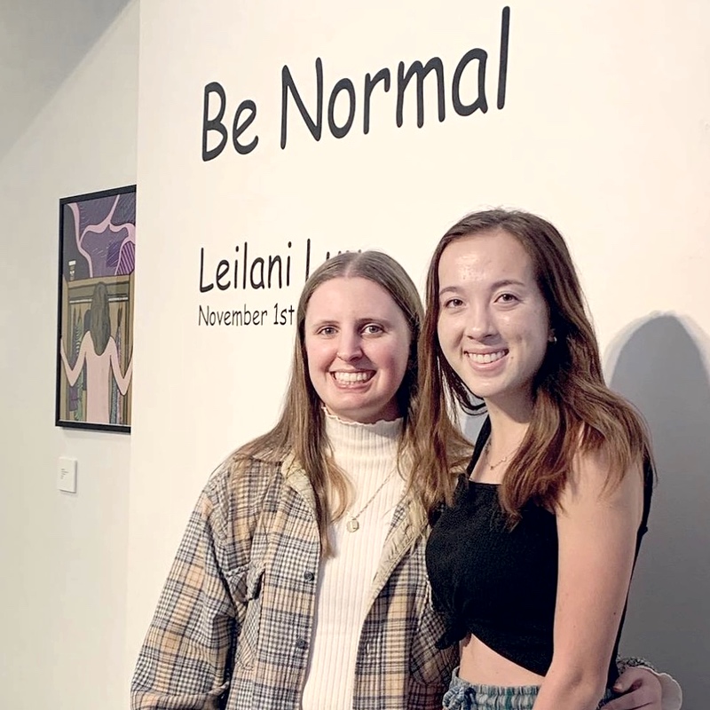 Luu (right) at her exhibit "Be Normal"