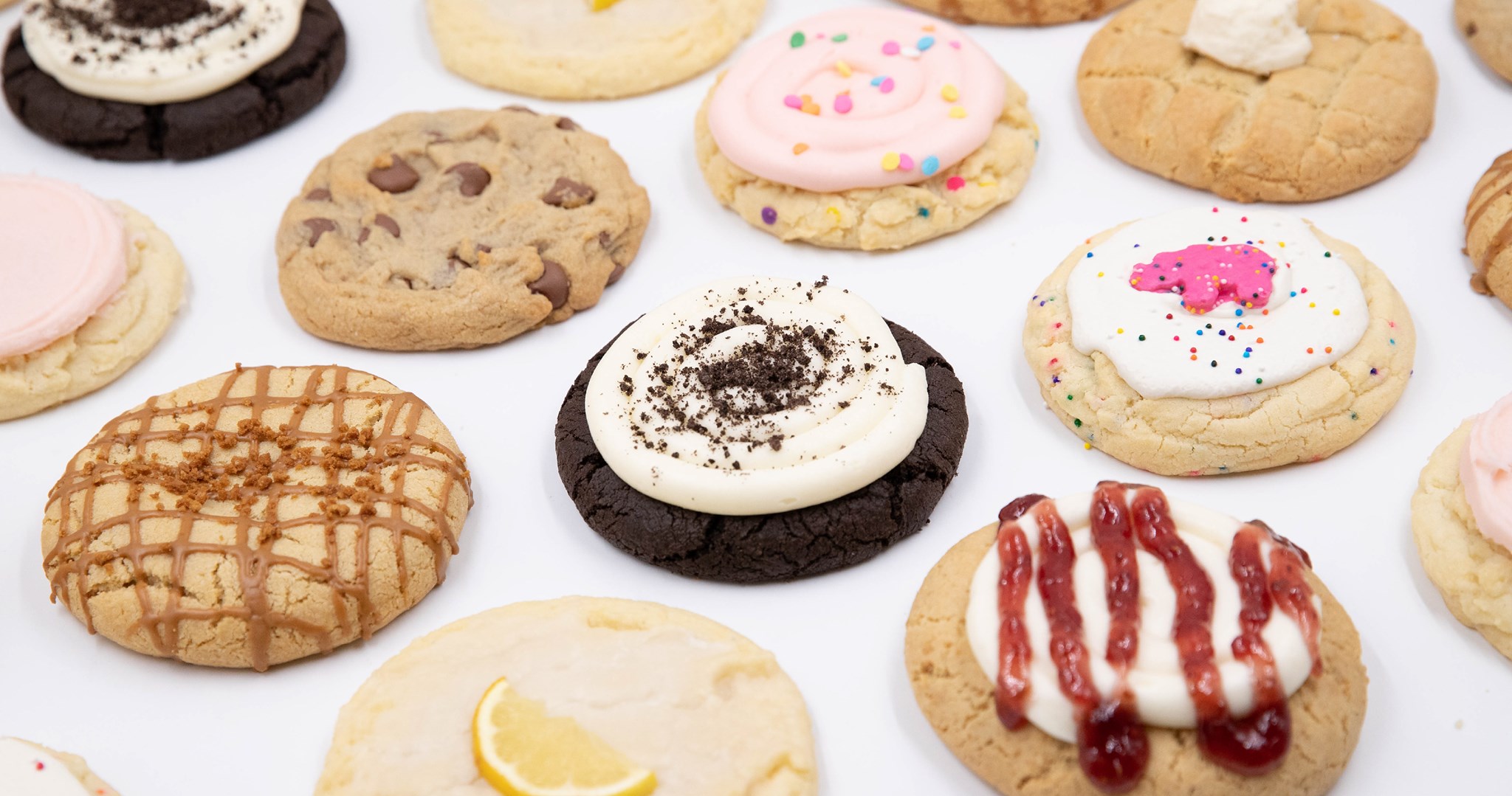 Crumbl cookies: cookies & cream, sprinkles, chocolate chip cookie, cookie with frosting and jam