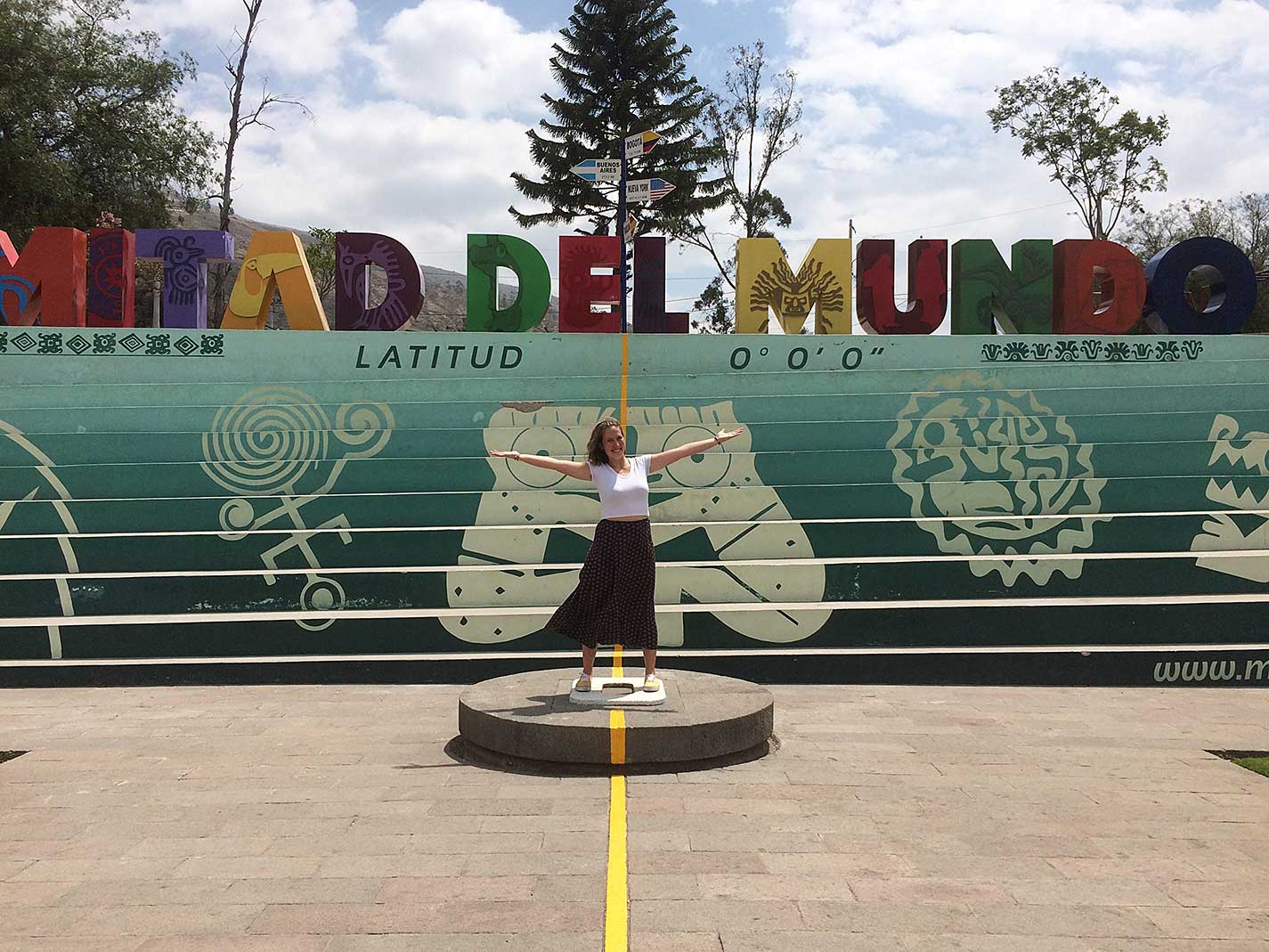 student in Ecuador on equator